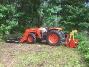 Tractor with Bush hog & forestry mulcher attacments